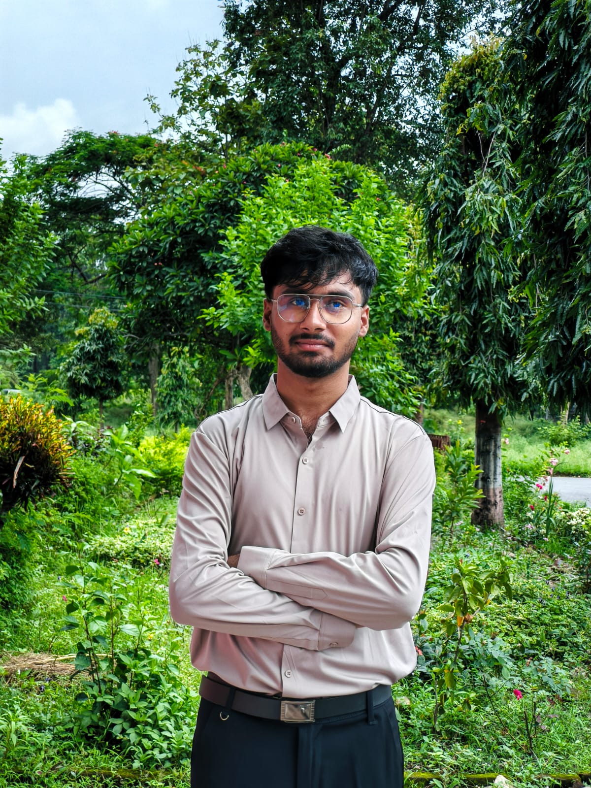 Nabin Joshi outdoors in a garden
