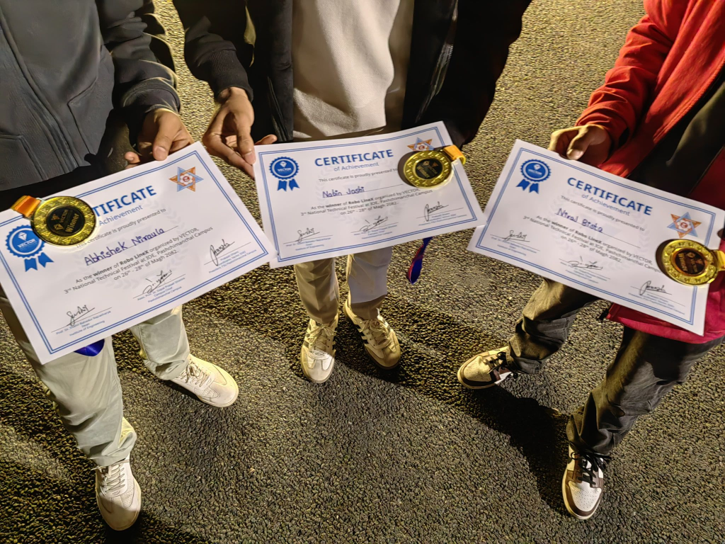 RobolineX team members holding competition certificates and medals